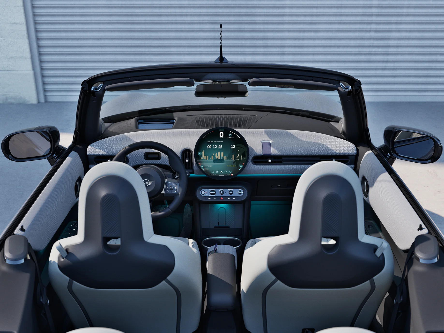 MINI Cooper Convertible’i salongi tagantvaade, fookusega armatuurlaual ja juhtpaneelil.
