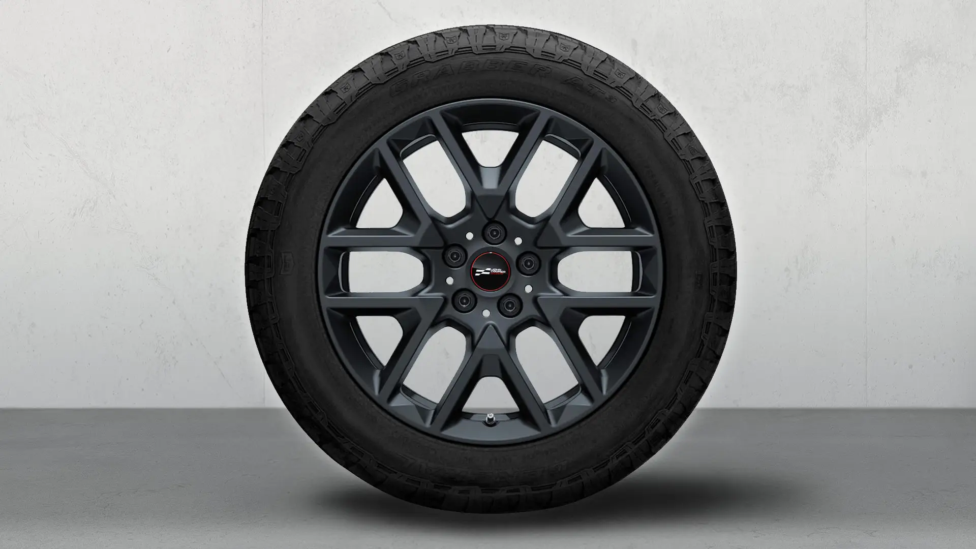 Lähivaade 18-tollisest JCW Y-Spoke stiilis 945 kergmetallveljest värvitoonis Frozen Midnight Grey.