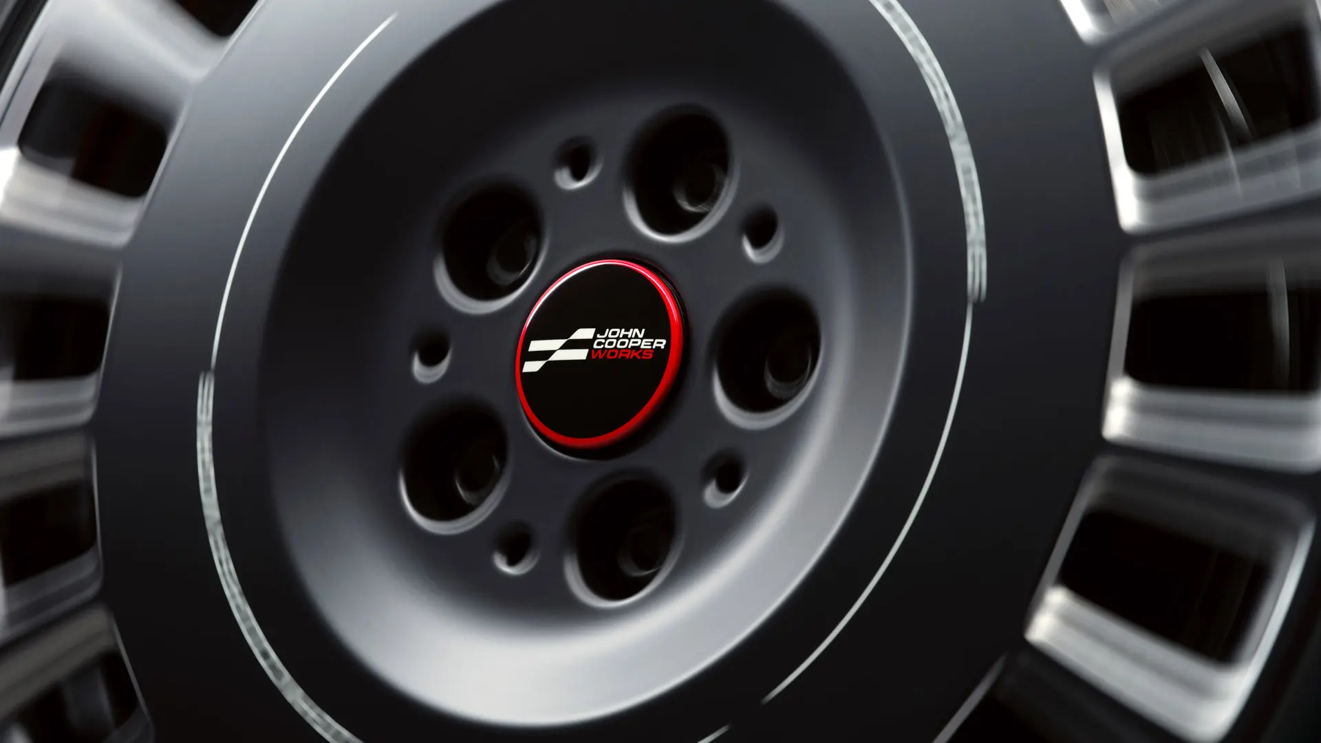 Lähivaade MINI JCW vabalt liikuvast rummukattest, mis jääb ratta pöörlemisel horisontaalseks.
